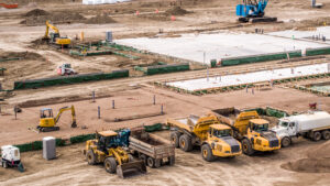 Construction,Site,Aerial,Views,Of,Foundation,And,Construction,Equipment
