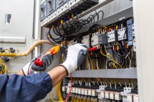 Electrician,Checking,The,Electrical,System,,With,An,Electric,Meter,For