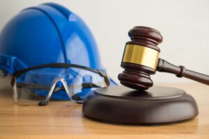 Hammer,Judge,Gavel,With,Construction,Hat,Helmet,,Worker,Safety,Glasses