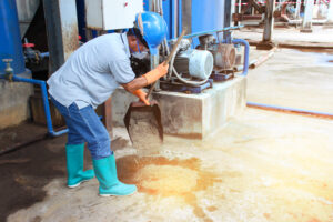 Manage,Spills,,Leaks,And,Disposal,Of,Chemicals,Leaking.,Asian,Man