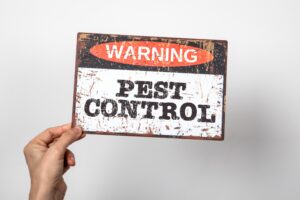 pest-control-warning-sign-text-woman